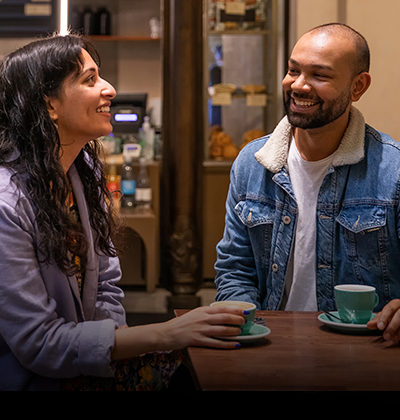Two friends catching up over a coffee